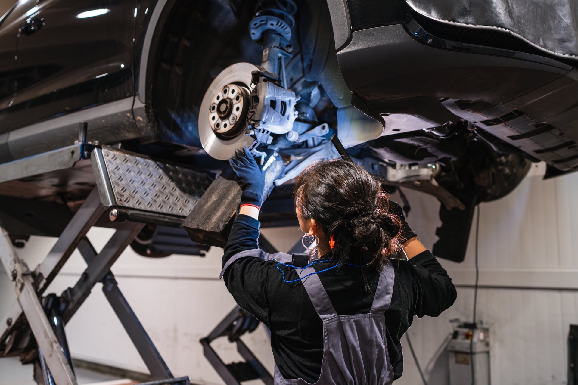Mechanic working on car